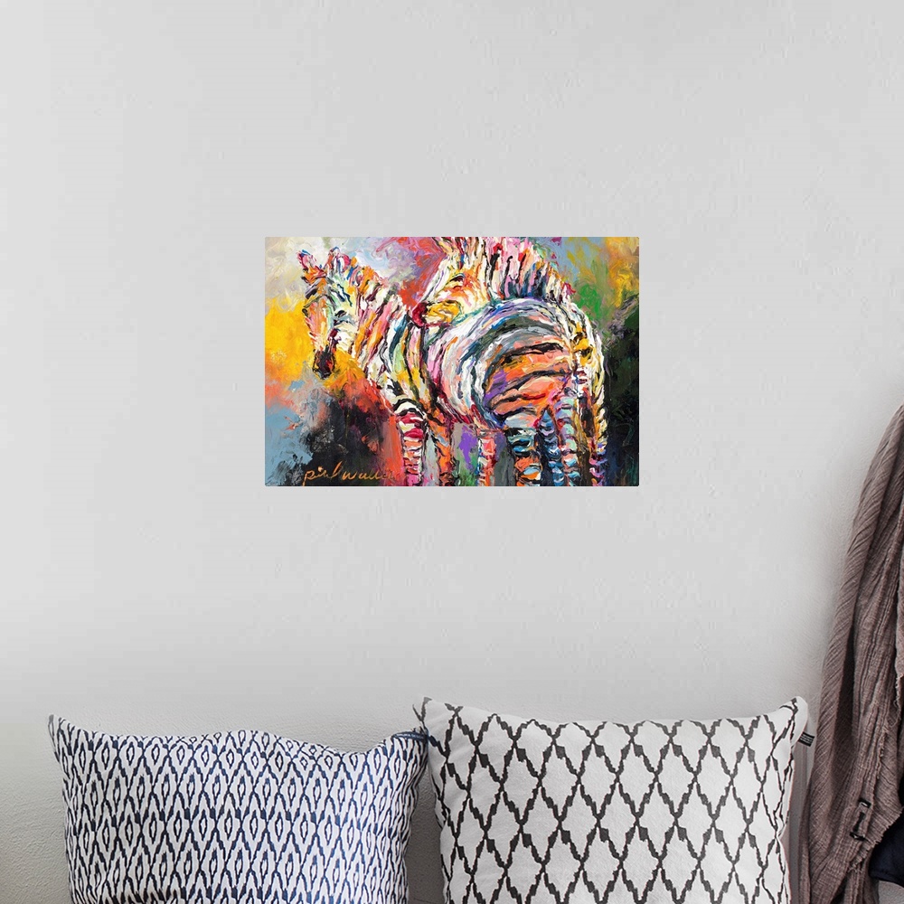 A bohemian room featuring Abstract painting of two colorful zebras leaning on each other.
