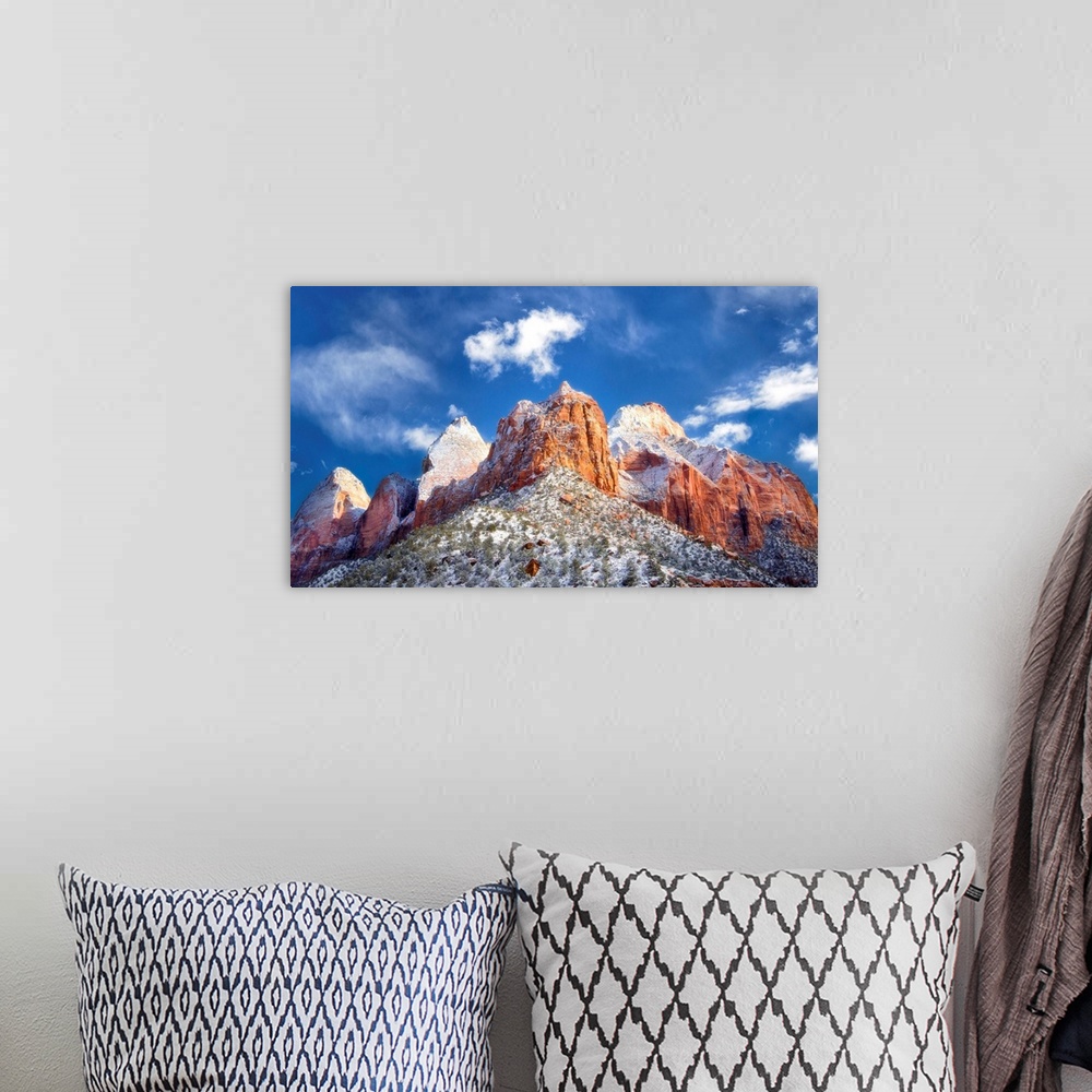 A bohemian room featuring Photograph of a mountainous rock formation Zion National Park in Utah.