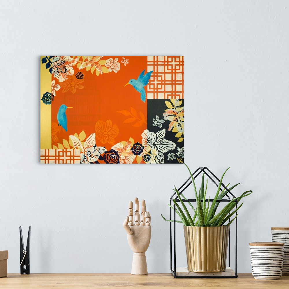 A bohemian room featuring Painting of two bluebirds a garden of orchids with orange background and screens.