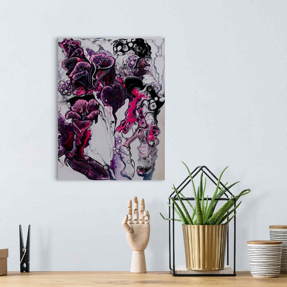 A bohemian room featuring Abstract painting of calla lilies using different shades and tints of purple, blue and pink.