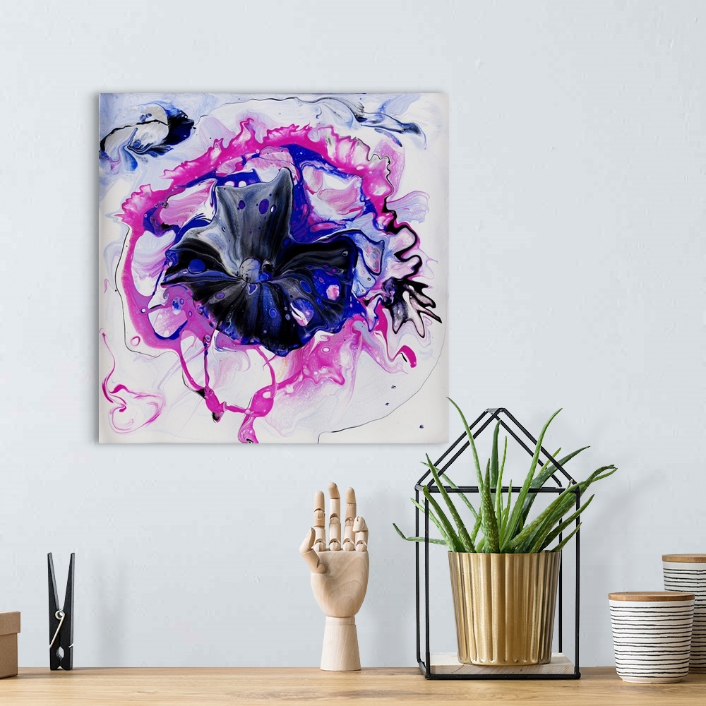 A bohemian room featuring Pour painting of a flower in vibrant pink and blue colors on a white, ample background for added ...