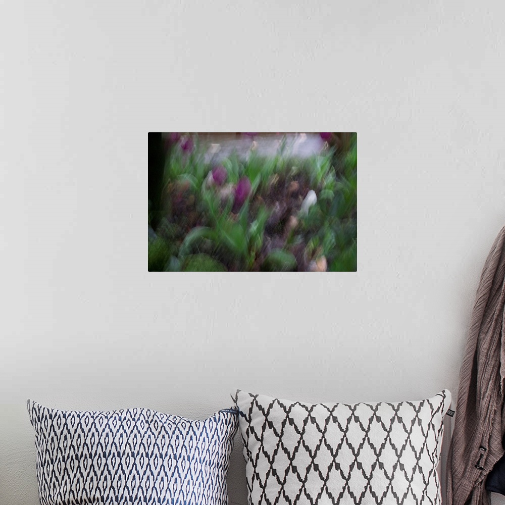 A bohemian room featuring Impressionist photograph of a garden with intentional movement.