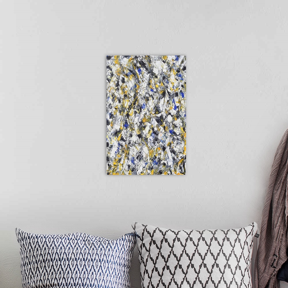 A bohemian room featuring Painting on paper of a medley organic shapes framed in blue and gold.
