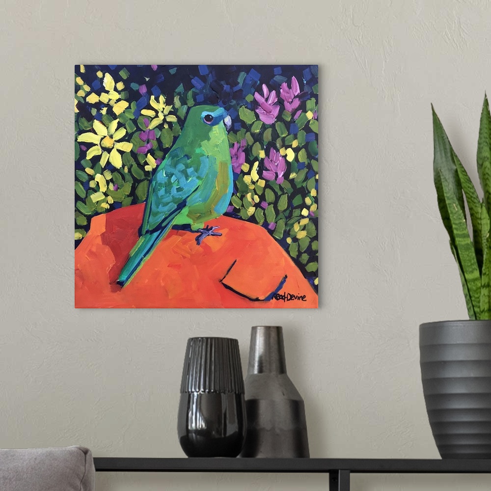 A modern room featuring NaAve painting of green parrot sitting on an orange rock with a background of flowers.