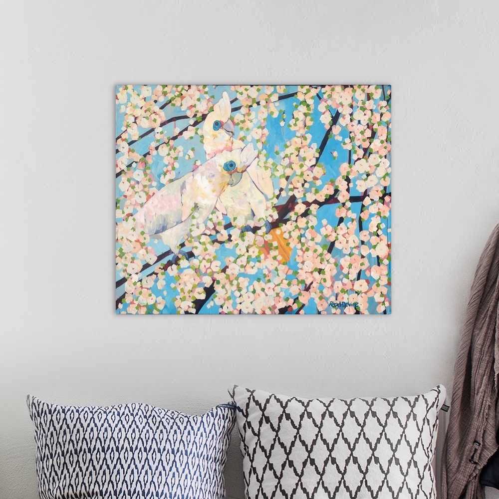A bohemian room featuring Impressionist painting of two white cockatoos sitting in a tree with white blossom and a backgrou...