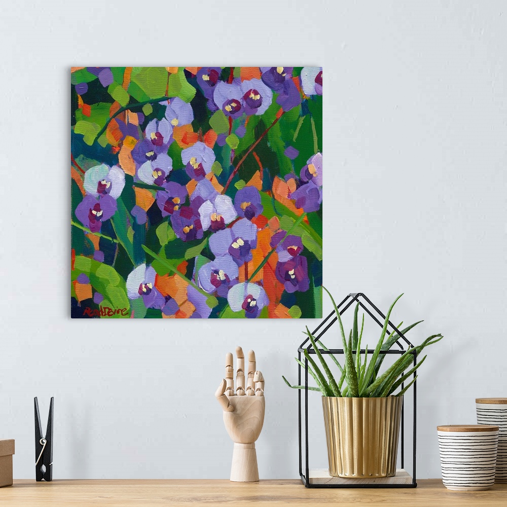 A bohemian room featuring Pattern like painting of purple wildflowers with orange background.