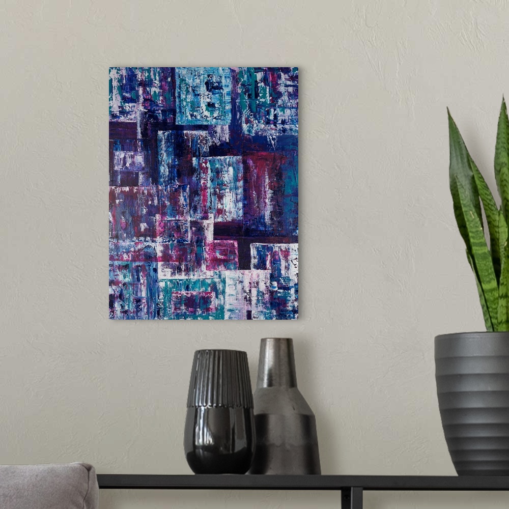A modern room featuring Painting on paper of geometric shapes harmonizing in tonal blues.