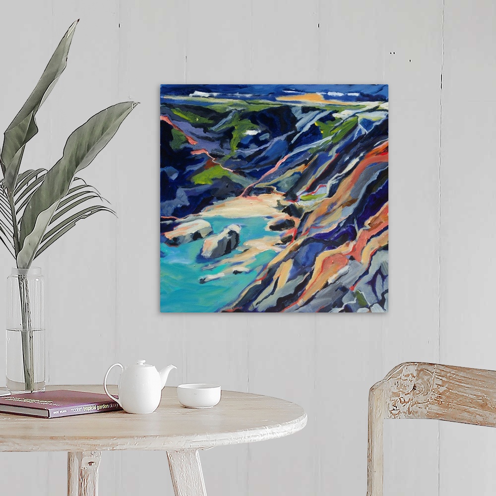 A farmhouse room featuring A ontemporary scene of a rocky beach cove from above with turquoise and deep blues.