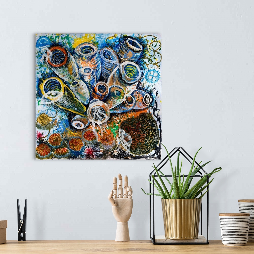 A bohemian room featuring Painting of a colony of clear jellyfish drifting around a bouquet of corals in saturated color.