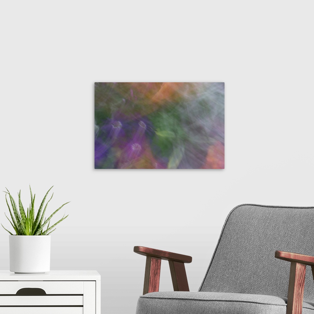 A modern room featuring Impressionist photograph of a garden with a dreamy feel.