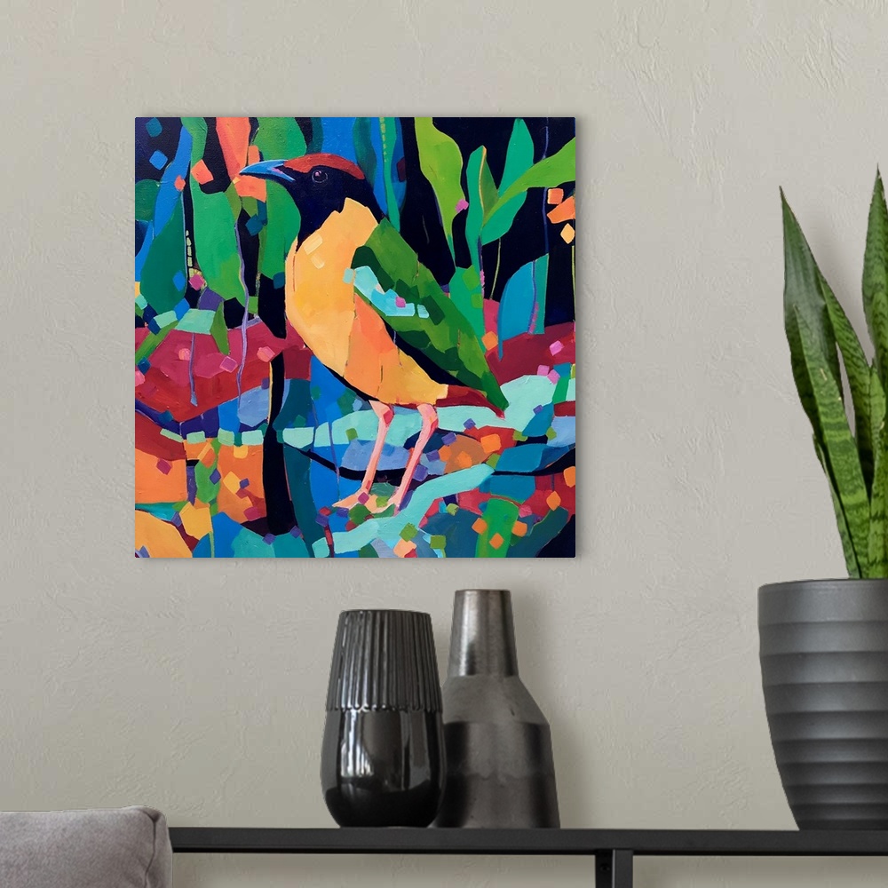 A modern room featuring Yellow green and red rainforest bird painting standing amongst abstract colorful shapes.