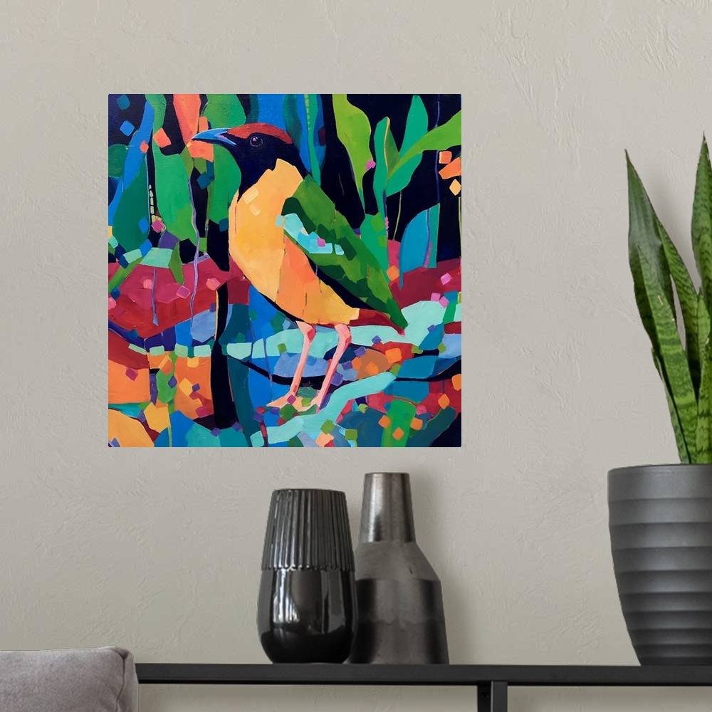A modern room featuring Yellow green and red rainforest bird painting standing amongst abstract colorful shapes.