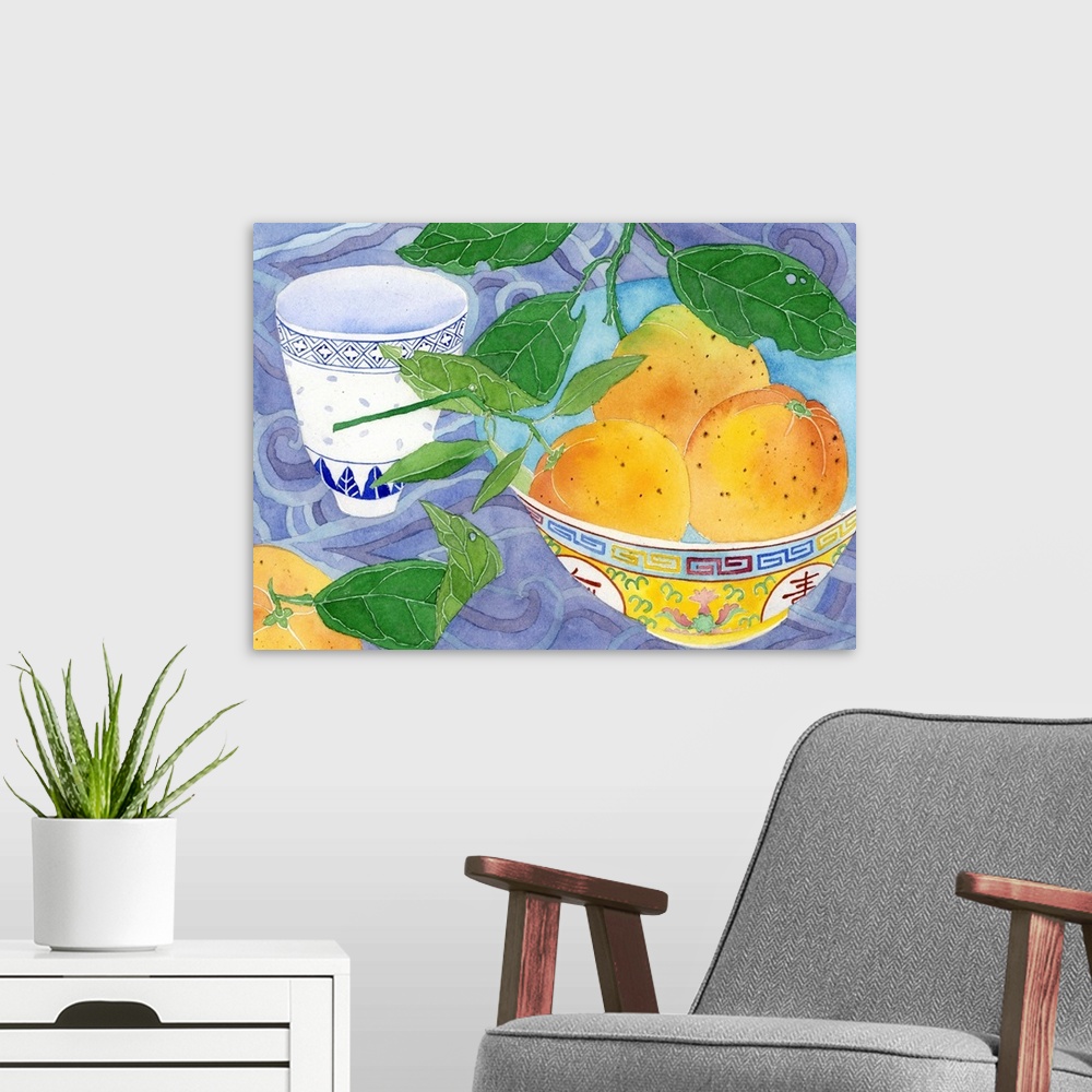A modern room featuring Home grown oranges in a yellow Chinese bowl and blue and white teacup with a backdrop of 'Chinese...