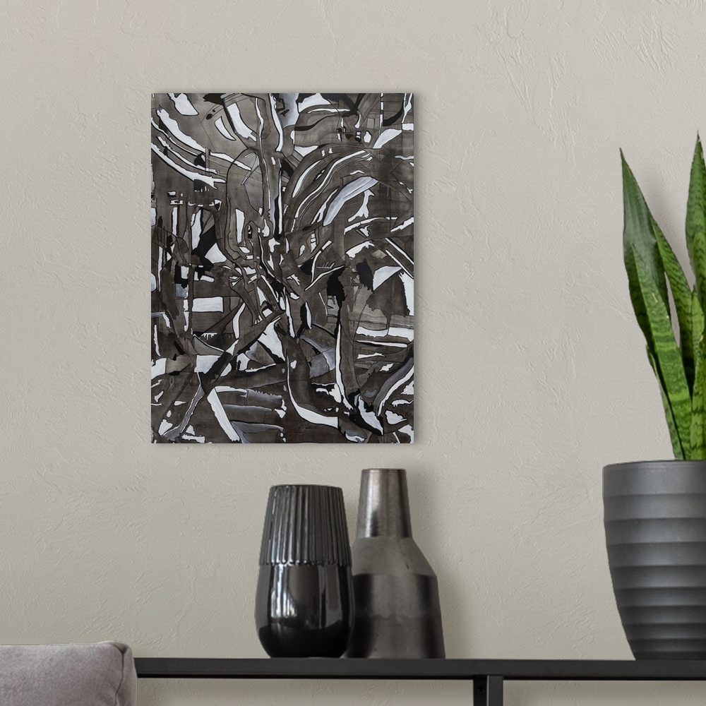A modern room featuring Painting on canvas of dark organic shapes illuminated by light.
