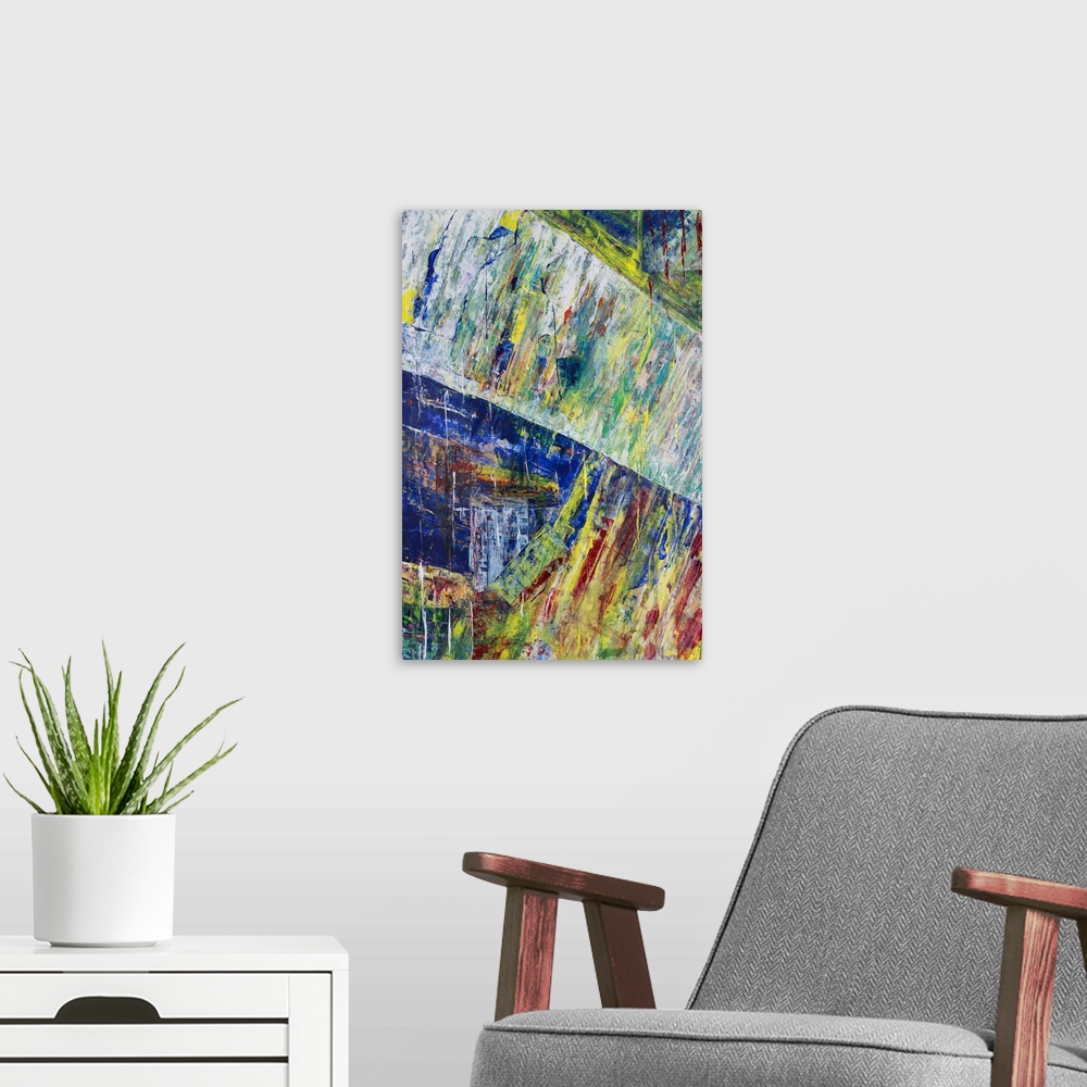 A modern room featuring Painting on paper of two vivid landscapes merging.