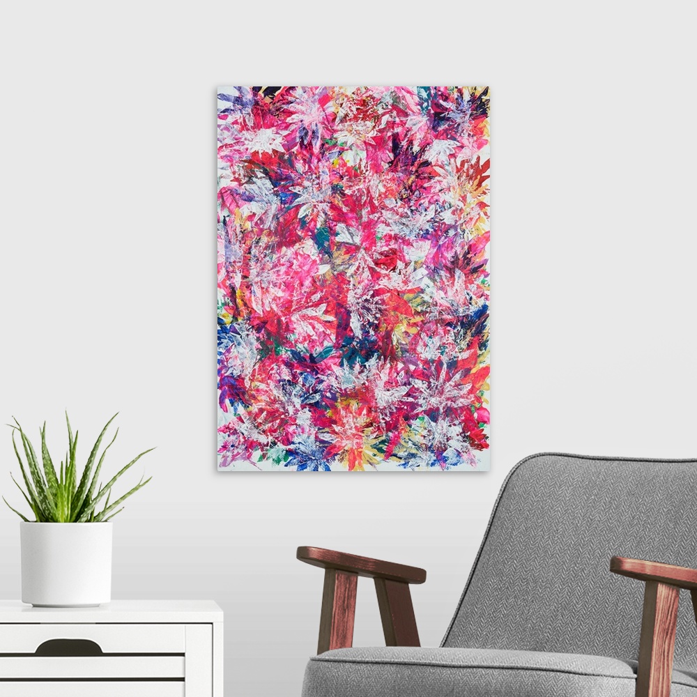 A modern room featuring Painting on paper of a dense compilation of leaves in vibrant spring tones.