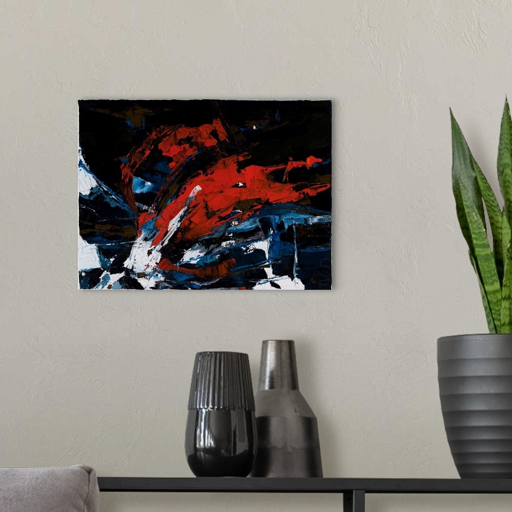 A modern room featuring An abstract painting of a play of warm and cool colors.