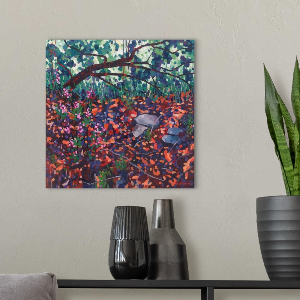 A modern room featuring Atmospheric painting of fallen tree with pink flowers and red and orange foreground.