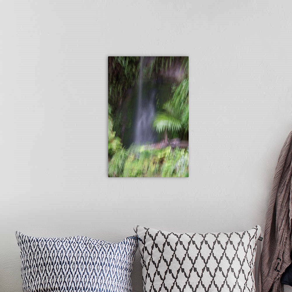 A bohemian room featuring Impressionist photograph of a waterfall in the Eden garden.