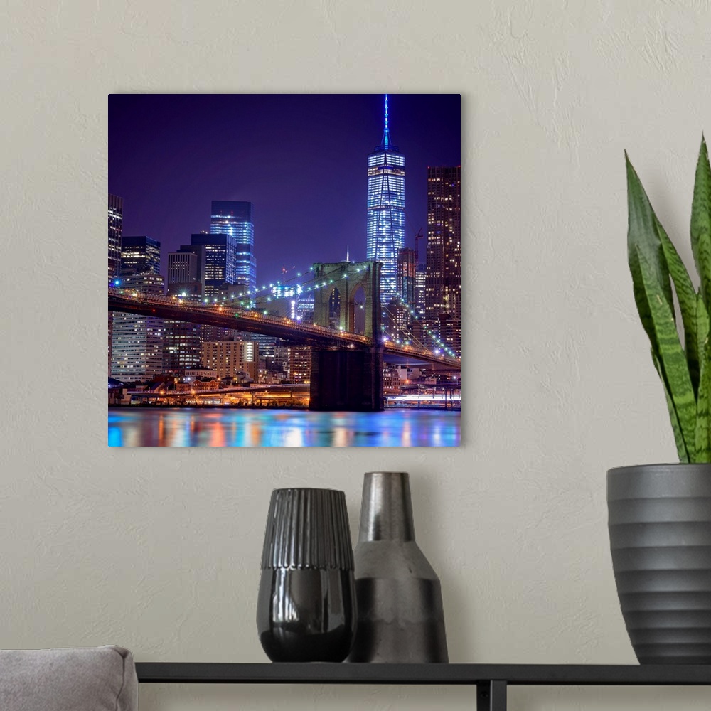 A modern room featuring Brooklyn Bridge And Freedom Tower At Night