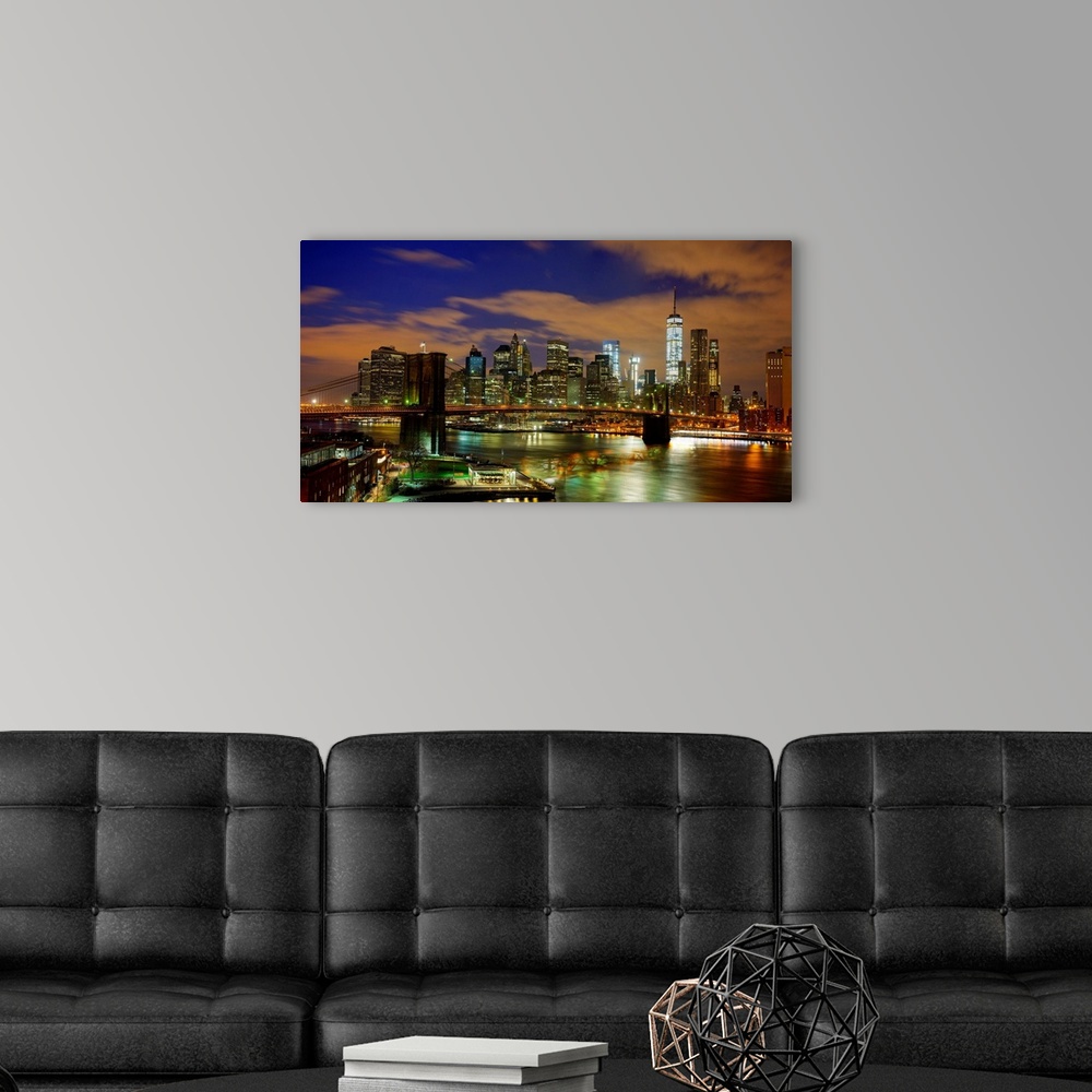 A modern room featuring Brooklyn Bridge And Lower Manhattan Panoramic View At Night