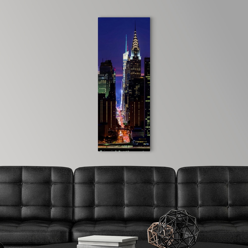 A modern room featuring Chrysler Building And 42nd Street At Night