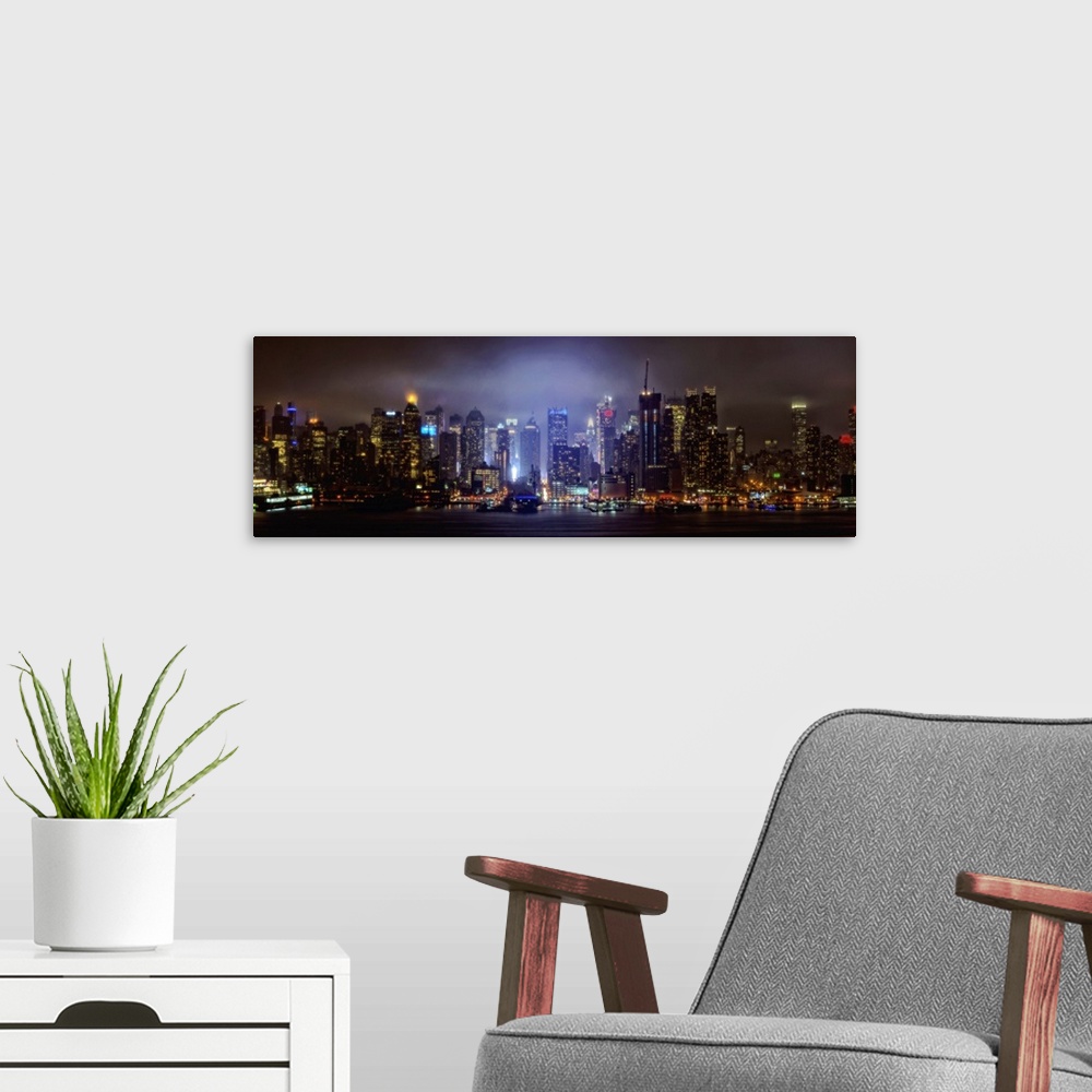 A modern room featuring Foggy Manhattan Panoramic View At Night