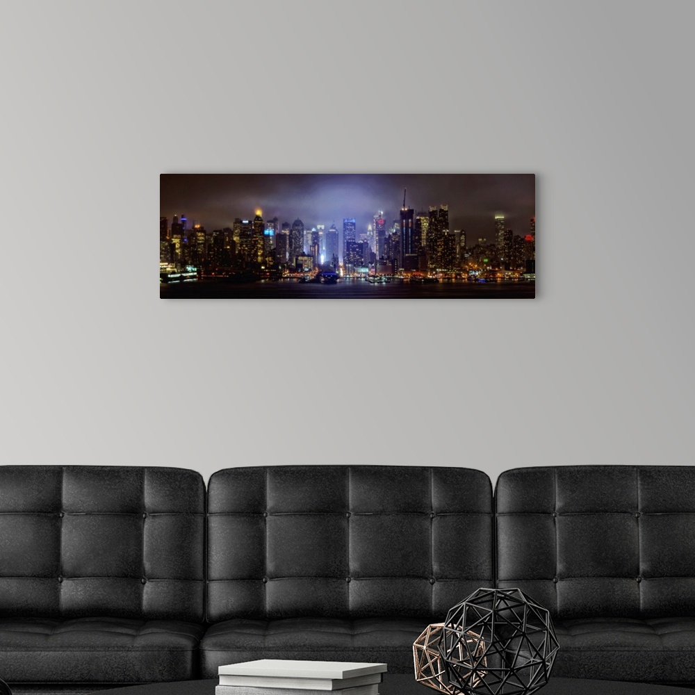 A modern room featuring Foggy Manhattan Panoramic View At Night