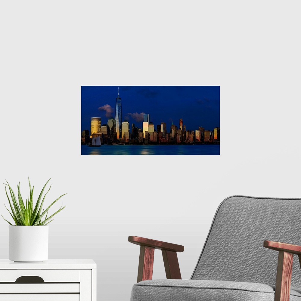 A modern room featuring Lower Manhattan Panoramic View At Sunset