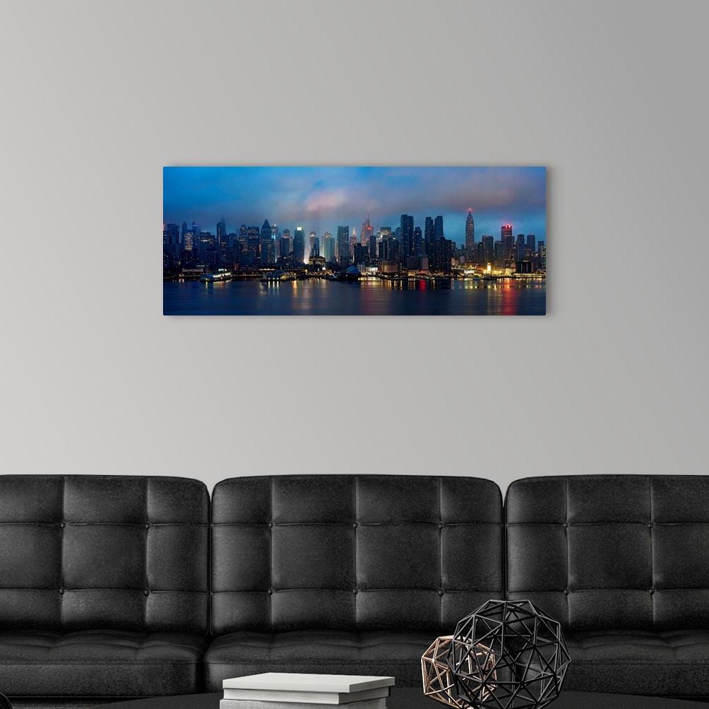 A modern room featuring Manhattan Panoramic View At Sunset