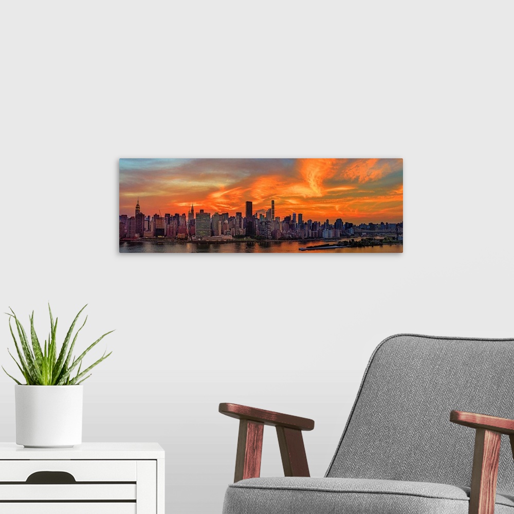 A modern room featuring Manhattan Panoramic View On East River At Sunset