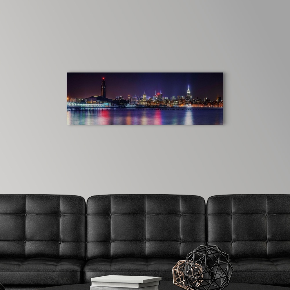 A modern room featuring Manhattan Panoramic View With Hoboken Train Station