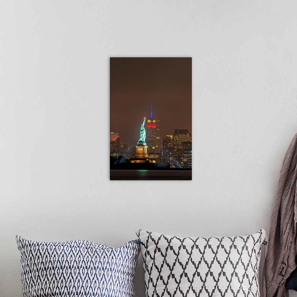 A bohemian room featuring Statue Of Liberty And Empire State Buillding At Night