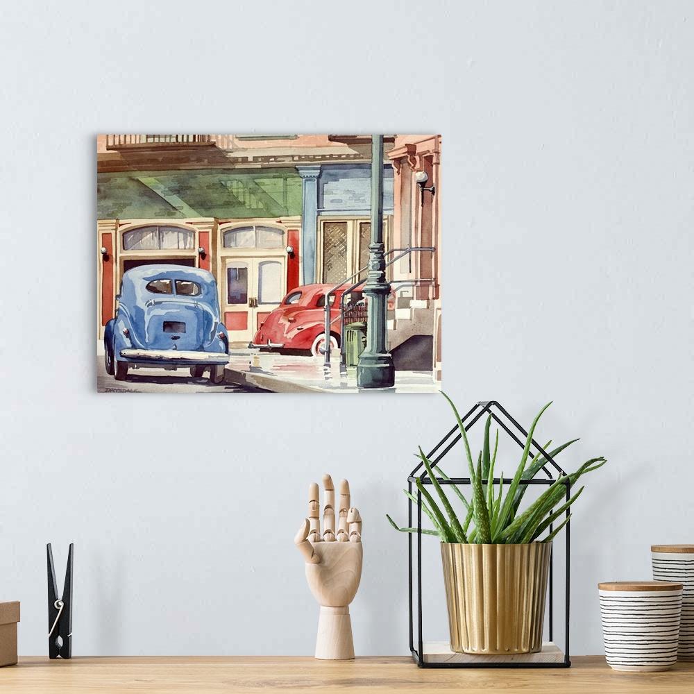 A bohemian room featuring Contemporary watercolor painting of a red and blue Volkswagen beetles driving down Main Street