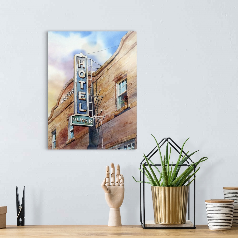 A bohemian room featuring Painting of the Hotel Oliver located at a historic train depot in Santa Rosa, CA