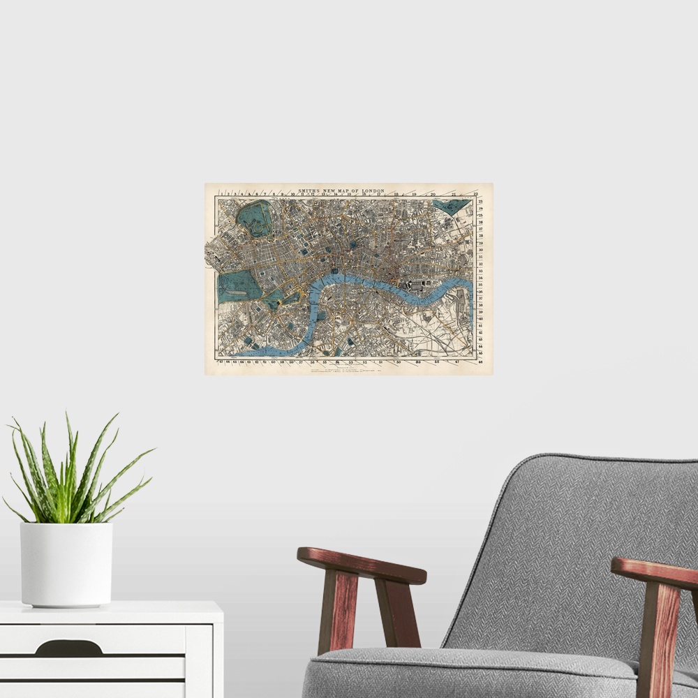 A modern room featuring This wall art is an aerial, hand drawn map of the city with street, building, and railway names.