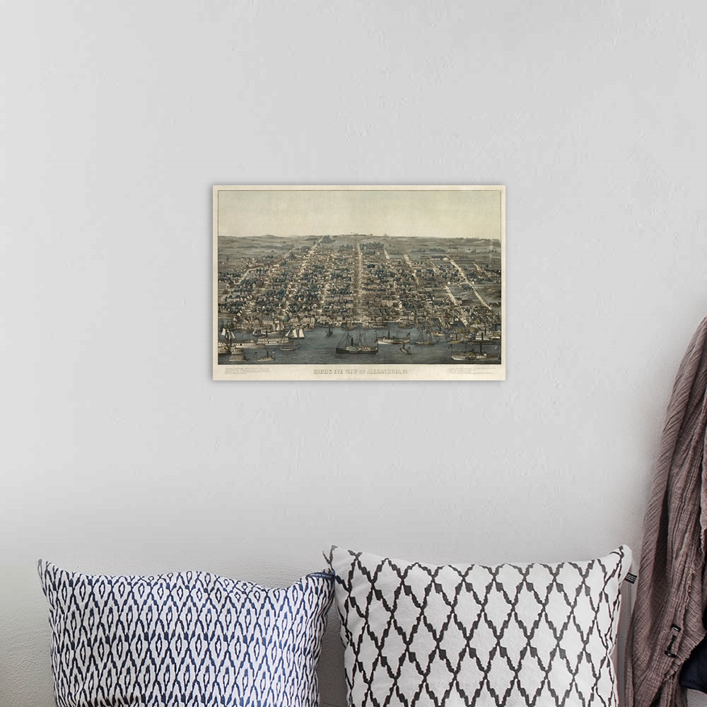 A bohemian room featuring An antiqued illustrated map of Alexandria printed on canvas.