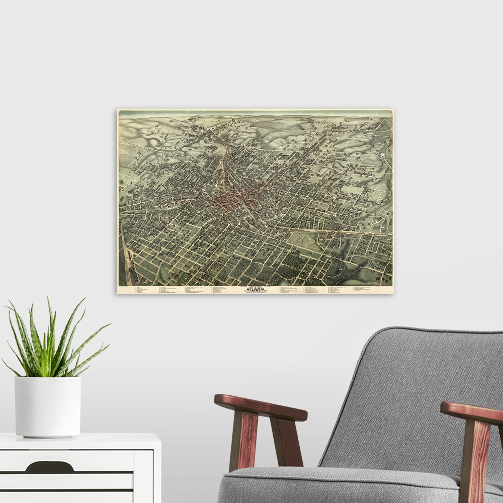 A modern room featuring This vintage map shows historic Atlanta streets and buildings; a legend at the bottom visible on ...