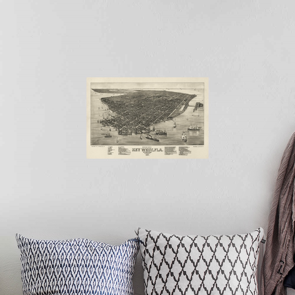 A bohemian room featuring Antique map featuring an aerial view of the town of Key West, Florida from 1884.