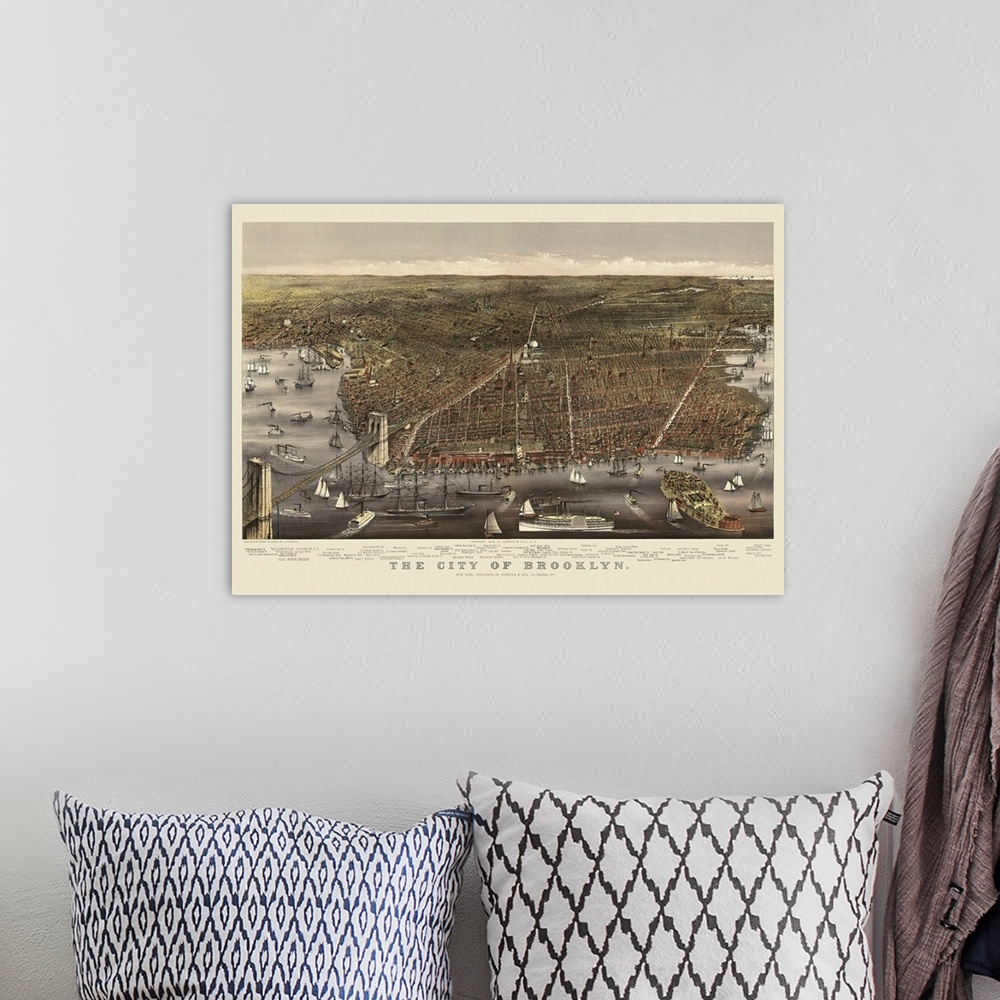 A bohemian room featuring This large piece is a vintage map of the city of Brooklyn. The water that surrounds the city is f...