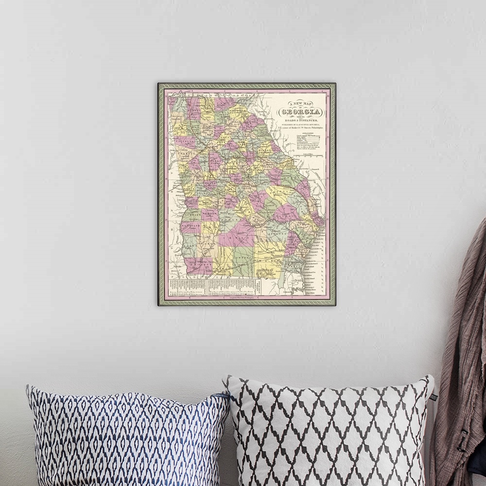 A bohemian room featuring Vintage Map of Georgia with its Roads and Distances