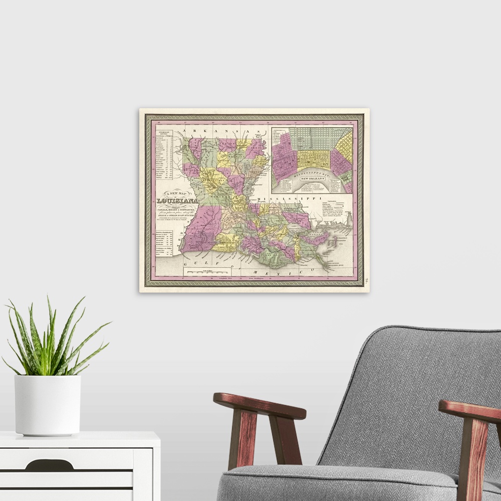 A modern room featuring This large piece is an antique map of the state of Louisiana. Different colors are used to separa...