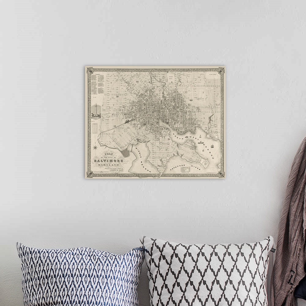 A bohemian room featuring Landscape, large wall hanging of a detailed vintage map plan of Baltimore, Maryland.