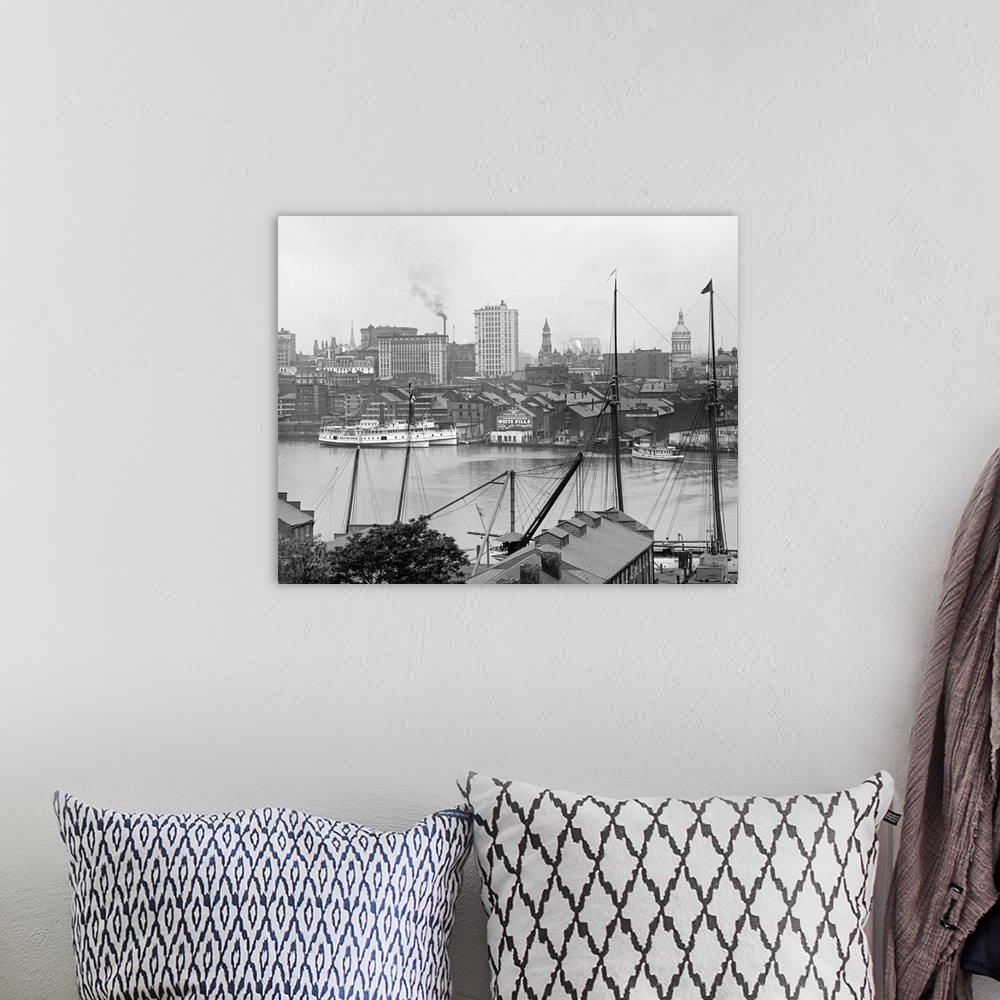A bohemian room featuring Retro photo of a harbor in Maryland printed on canvas.