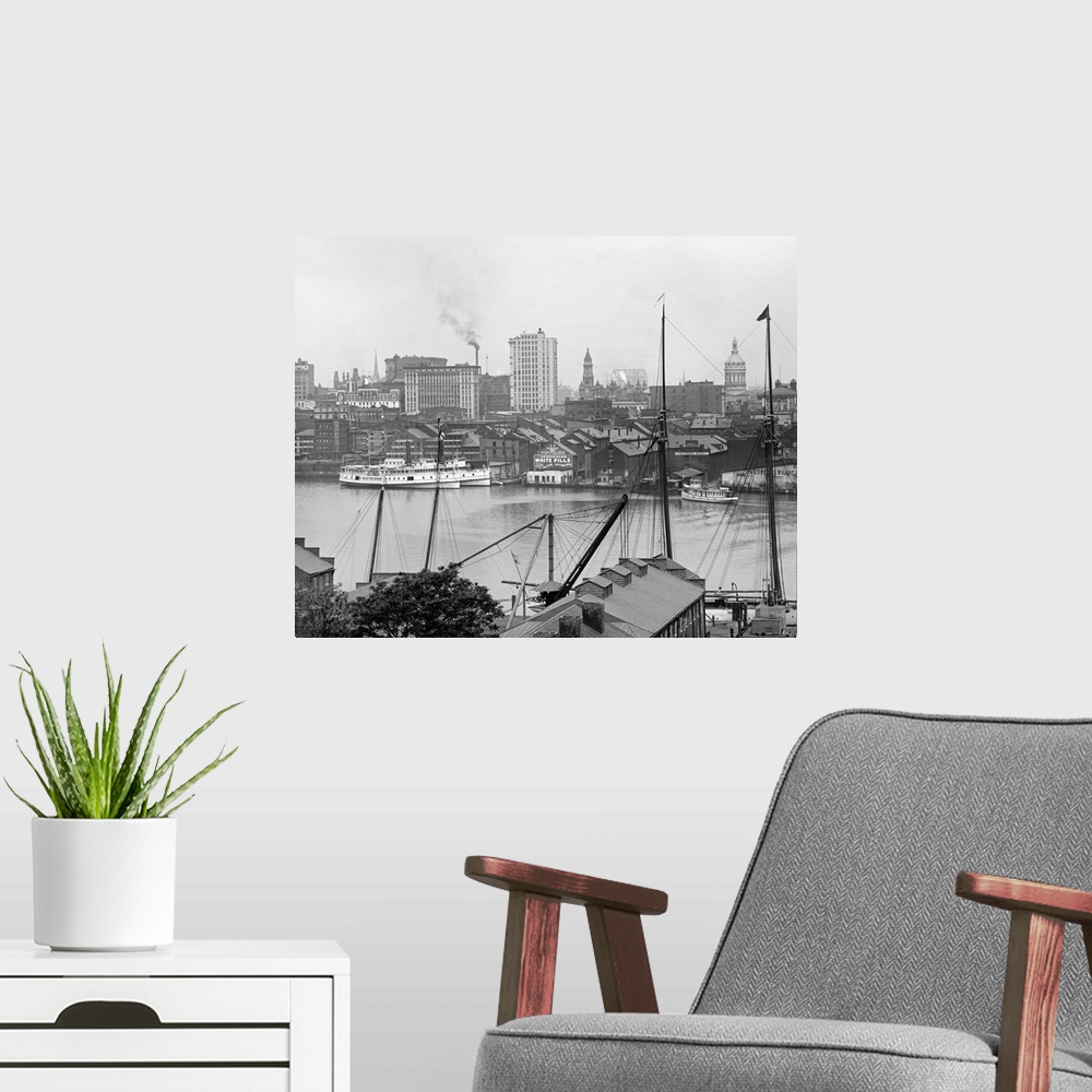 A modern room featuring Retro photo of a harbor in Maryland printed on canvas.
