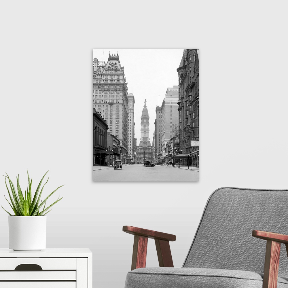 A modern room featuring This is a vintage photograph in black and white of downtown Philadelphia. Tall buildings line the...