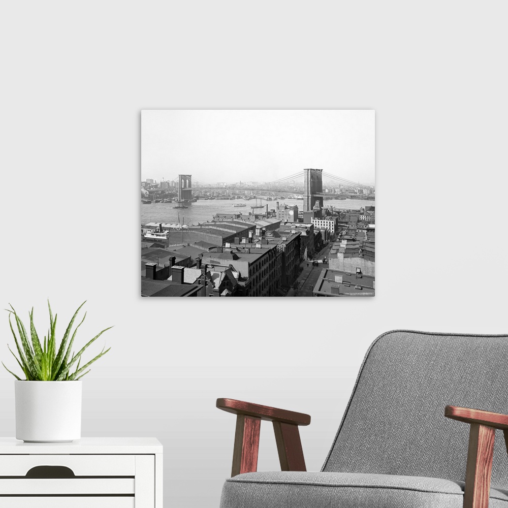 A modern room featuring Vintage photograph of Brooklyn Bridge and East River, New York City
