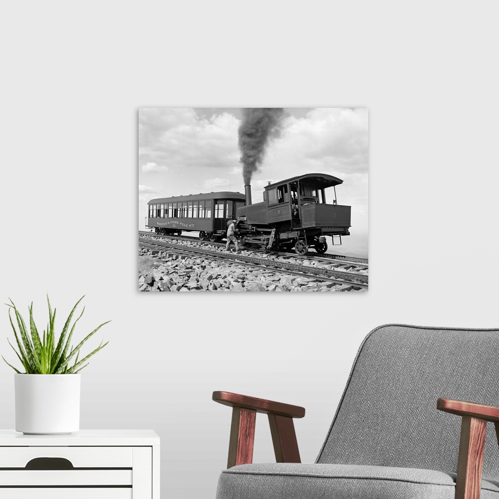 A modern room featuring Vintage photograph of Cog Wheel Train, Summit of Pikes Peak, Colorado