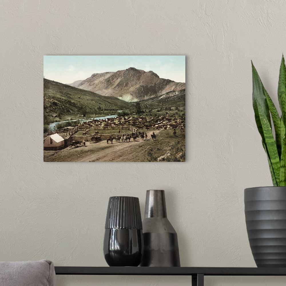 A modern room featuring Vintage photograph of Cowboys on the Cimarron River, Colorado