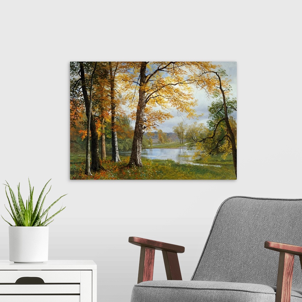 A modern room featuring Classic painting of a small wooded grove near a pond, the trees in autumn colors and hills in the...